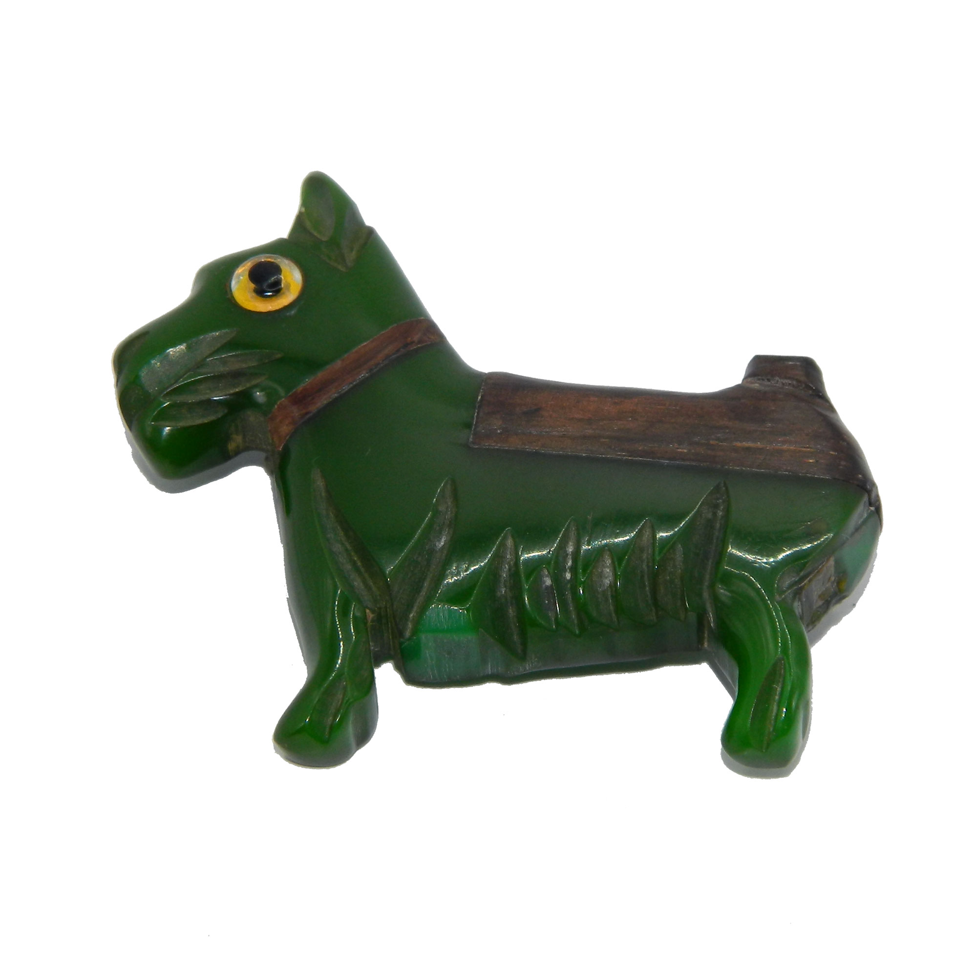 Hand carved bakeite dog brooch
