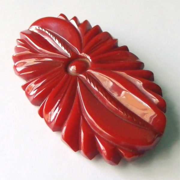 Large 1940's red bakelite brooch