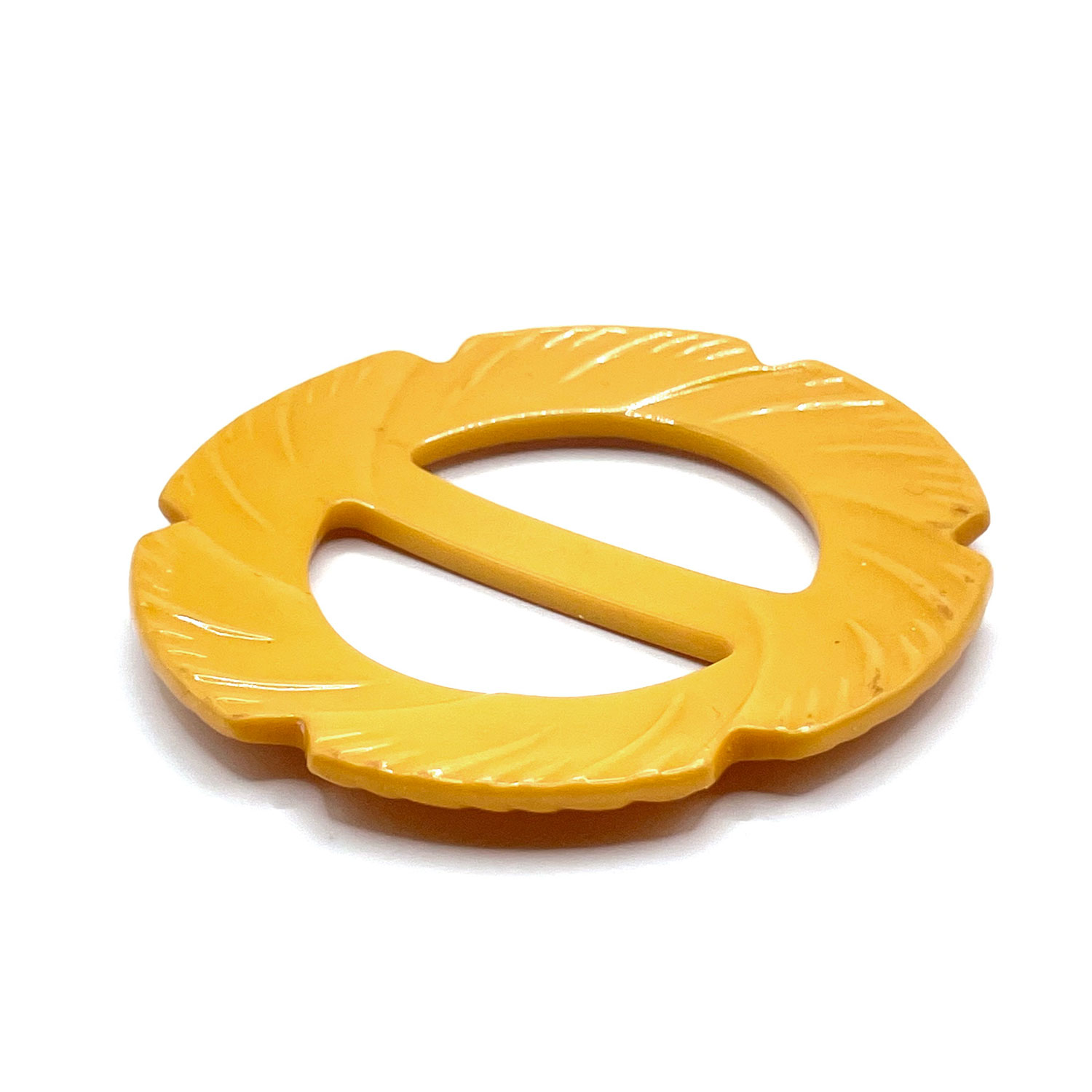 1930s carved bakelite belt buckle
