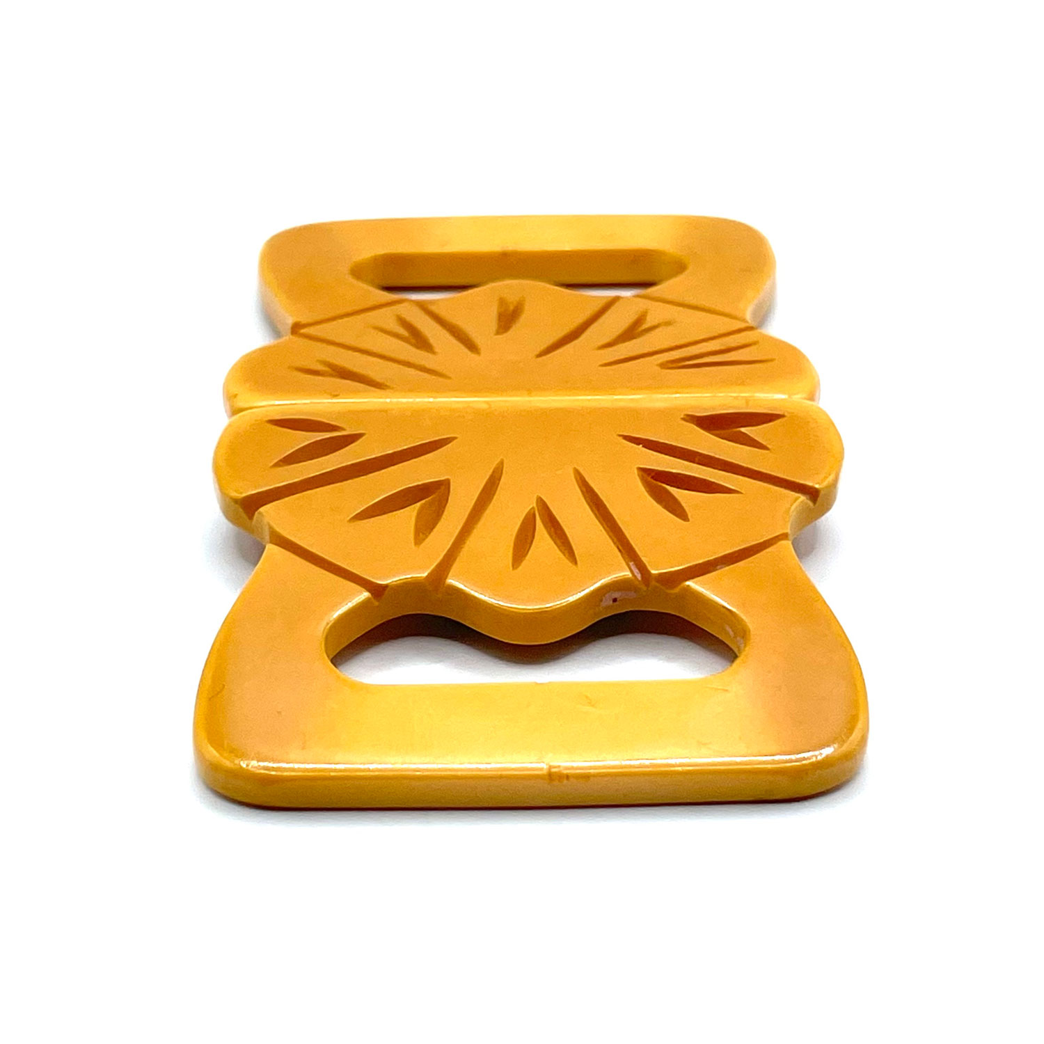 1930s carved bakelite belt buckle