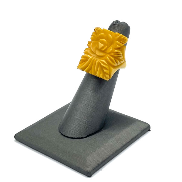 Hand carved bakelite ring