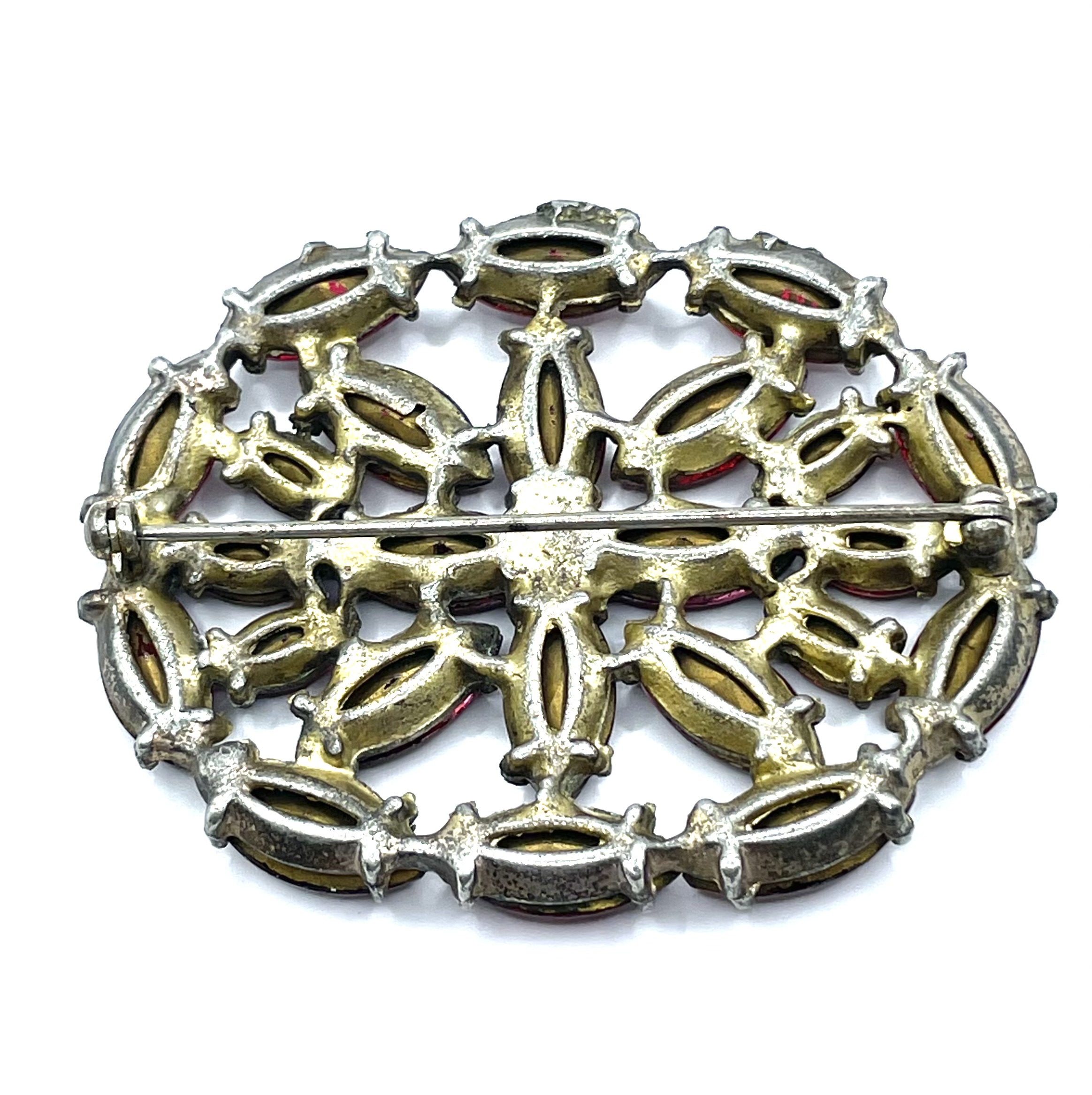 red rhinestone brooch