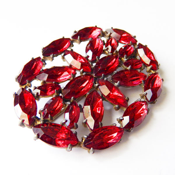 red rhinestone brooch