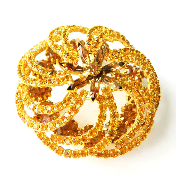 Spiral rhinestone brooch by Hobé