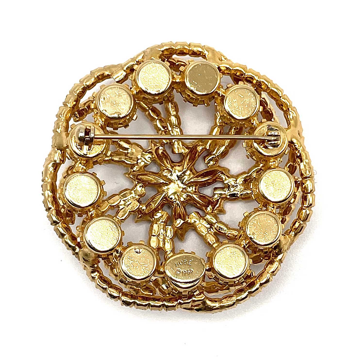 Spiral rhinestone brooch by Hob&eacute;