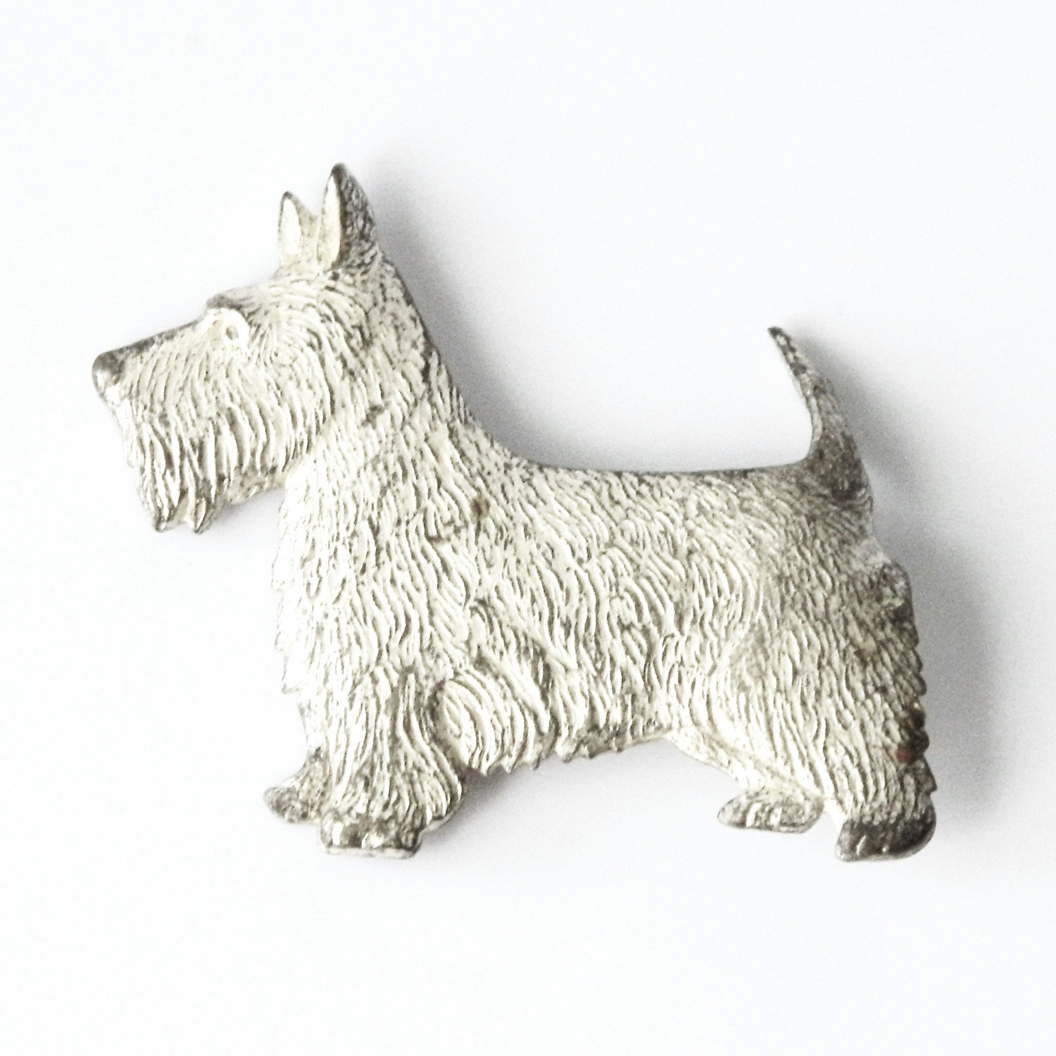 Scottie dog brooch