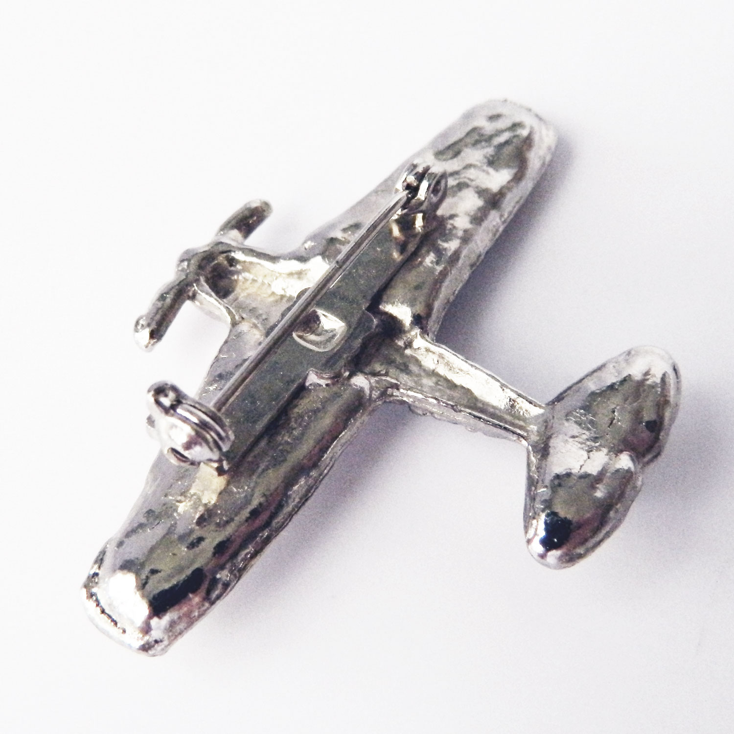 Rhinestone airplane brooch