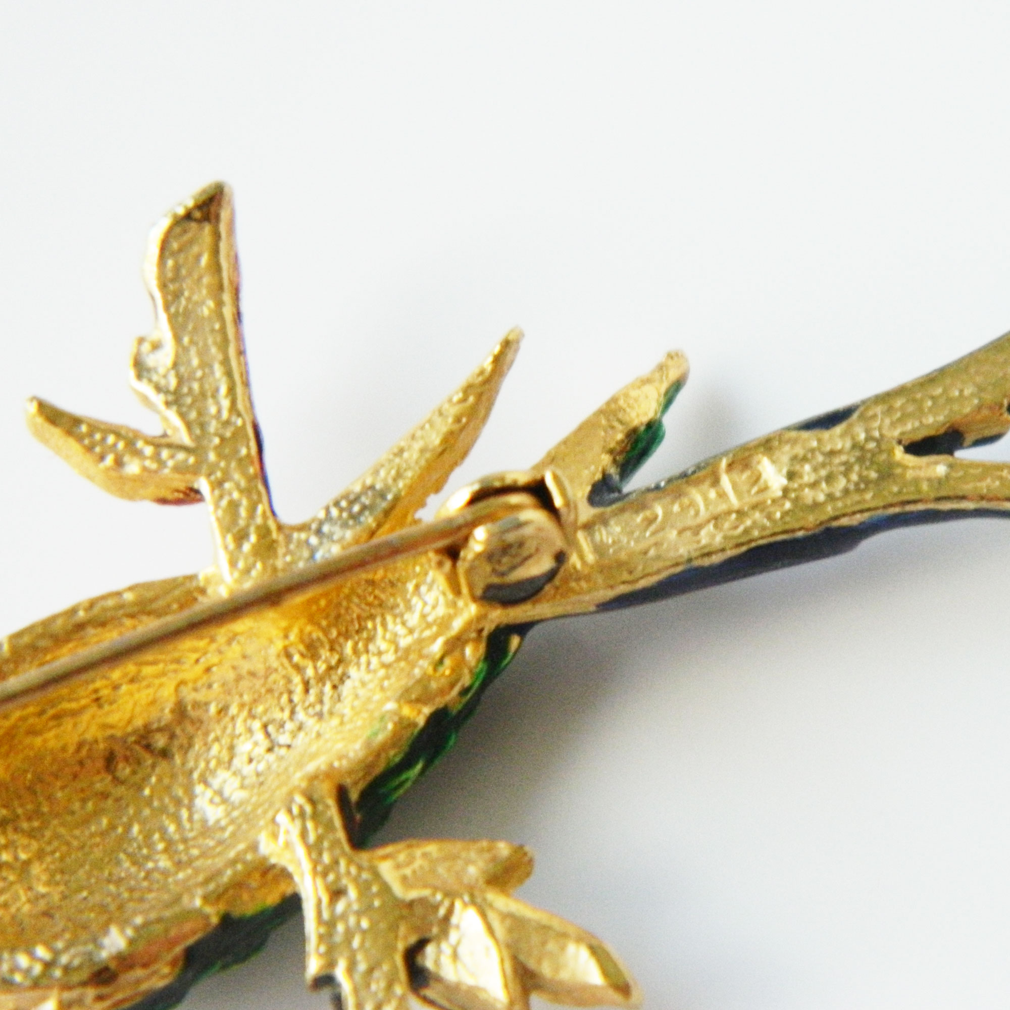 bird on a branch brooch