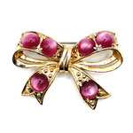 Coro bow brooch