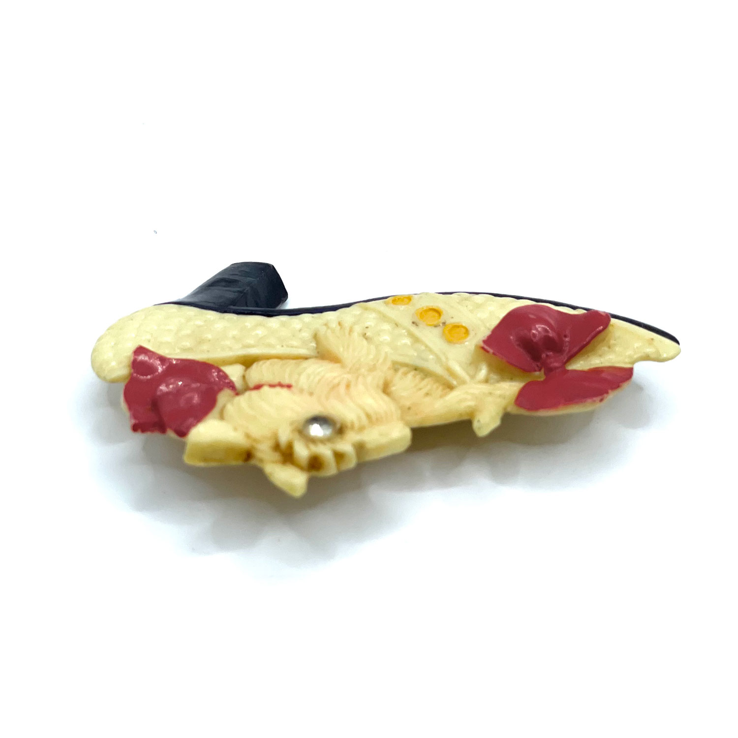 1930s celluloid dog in shoe rhinestone brooch