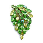 green and yellow rhinestone pin