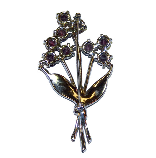 1940's enameled faus star ruby brooch