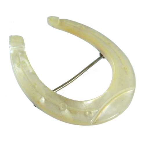 Antique mother of pearl horseshoe brooch