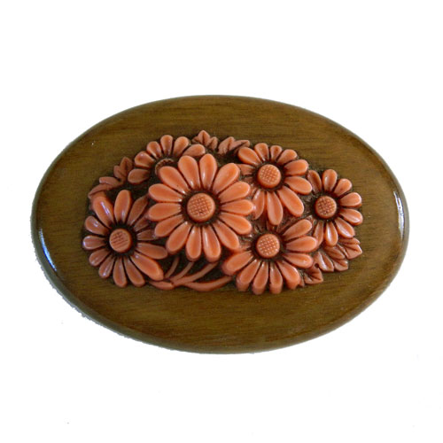 celluloid flower brooch