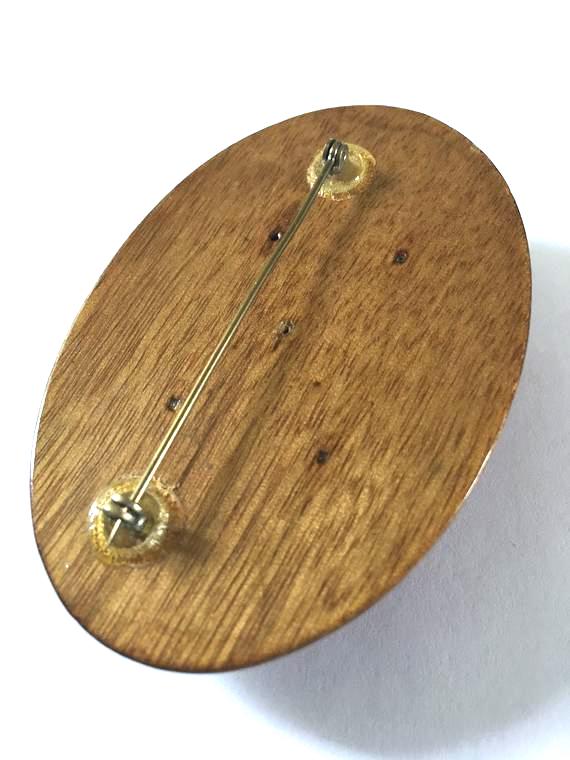 wooden brooch