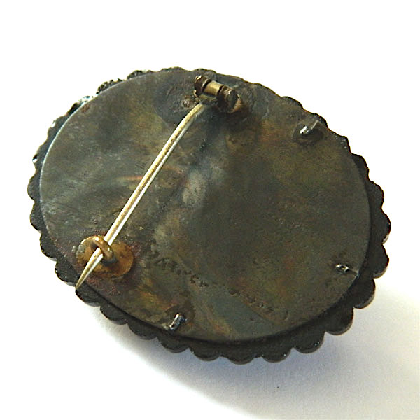 Antique jet cameo brooch