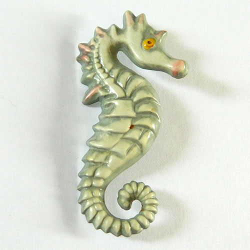 Vintage celluloid dog brooch