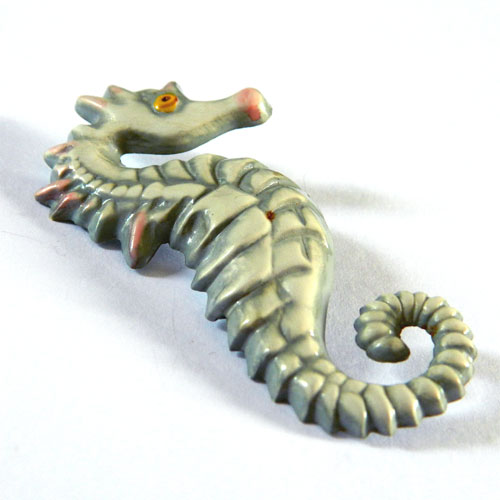 Vintage celluloid dog brooch
