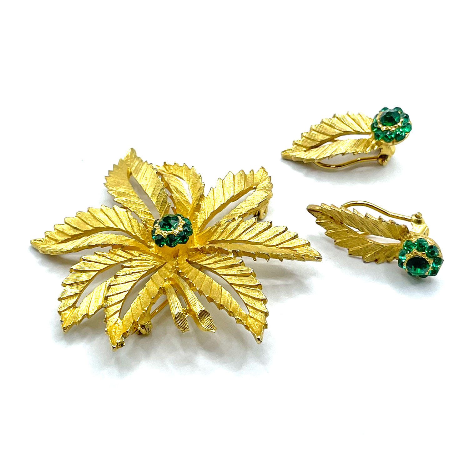 green rhinestone brooch and clip earrings