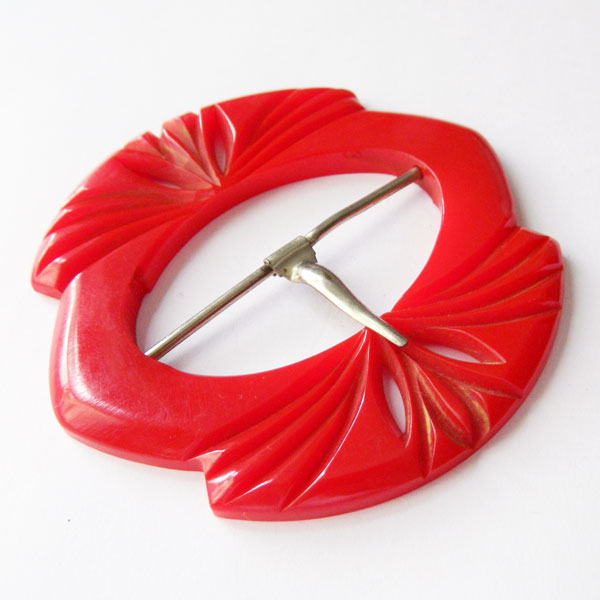 1930's red bakelite belt buckle