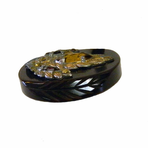vintage carved bakelite button