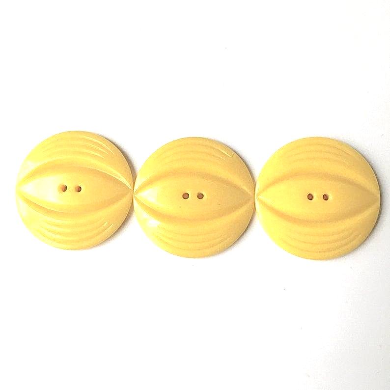 1930s yellow coat buttons