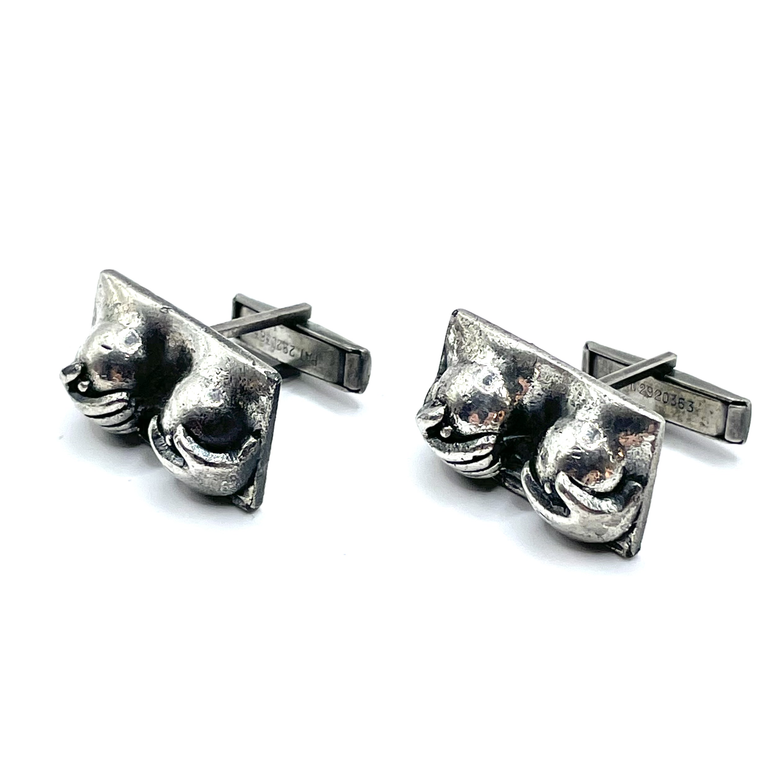 Silver tone cuff link set