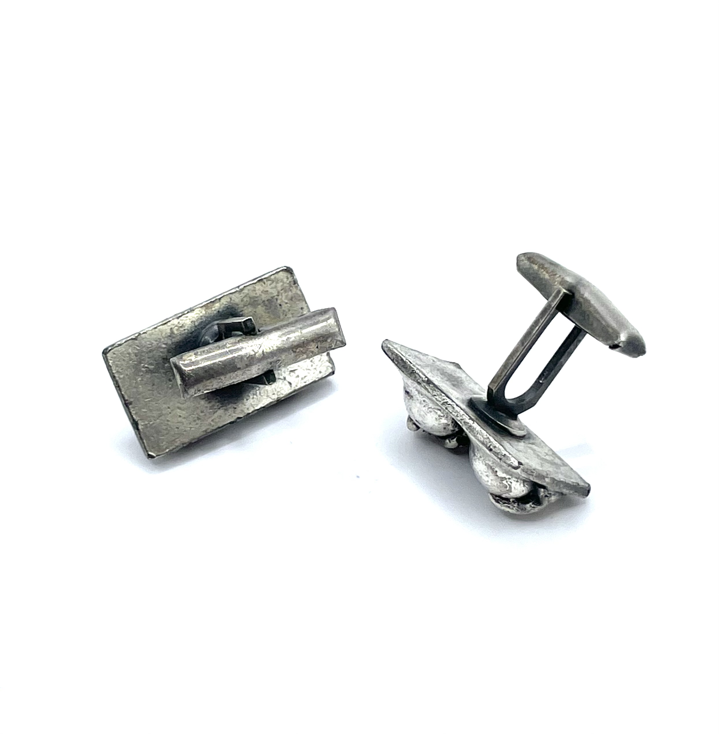 Silver tone cuff link set