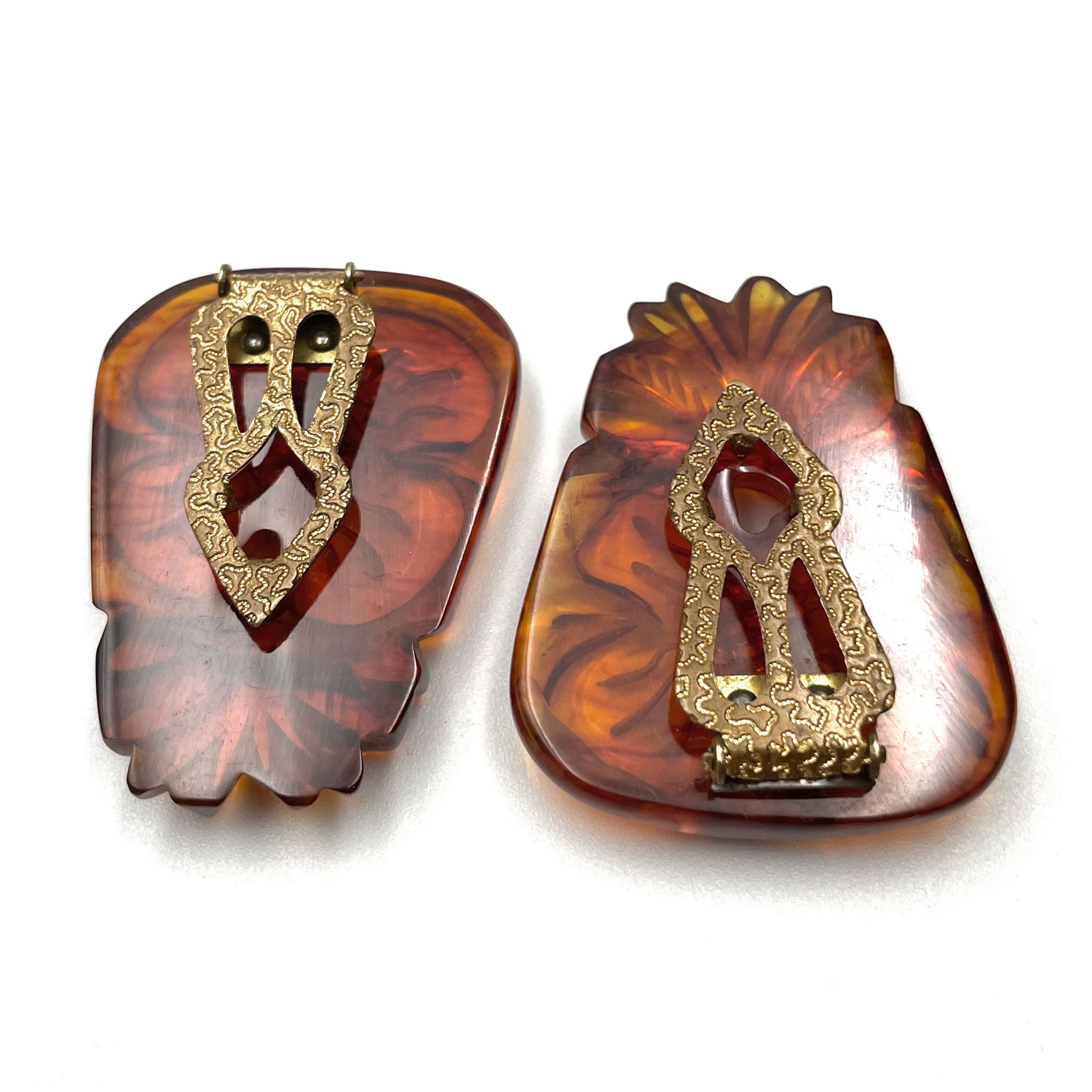 Pair of bakelite dress clips