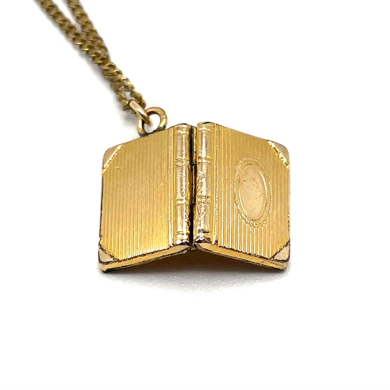 tiny vintage book locket