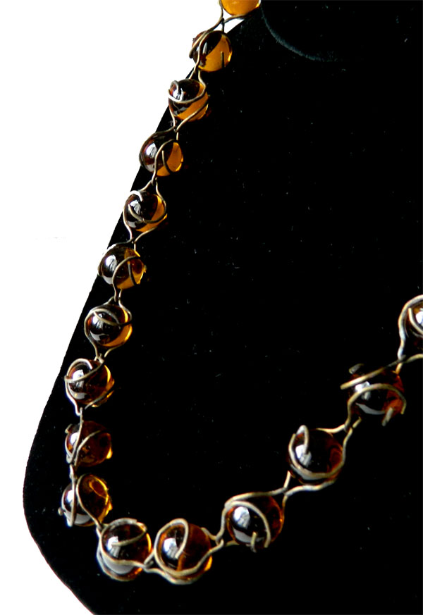 Amber glass pools of light necklace