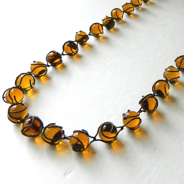 Amber glass pools of light necklace