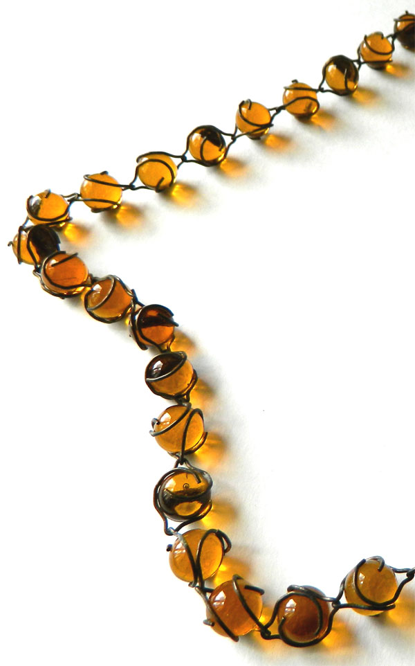 Amber glass pools of light necklace