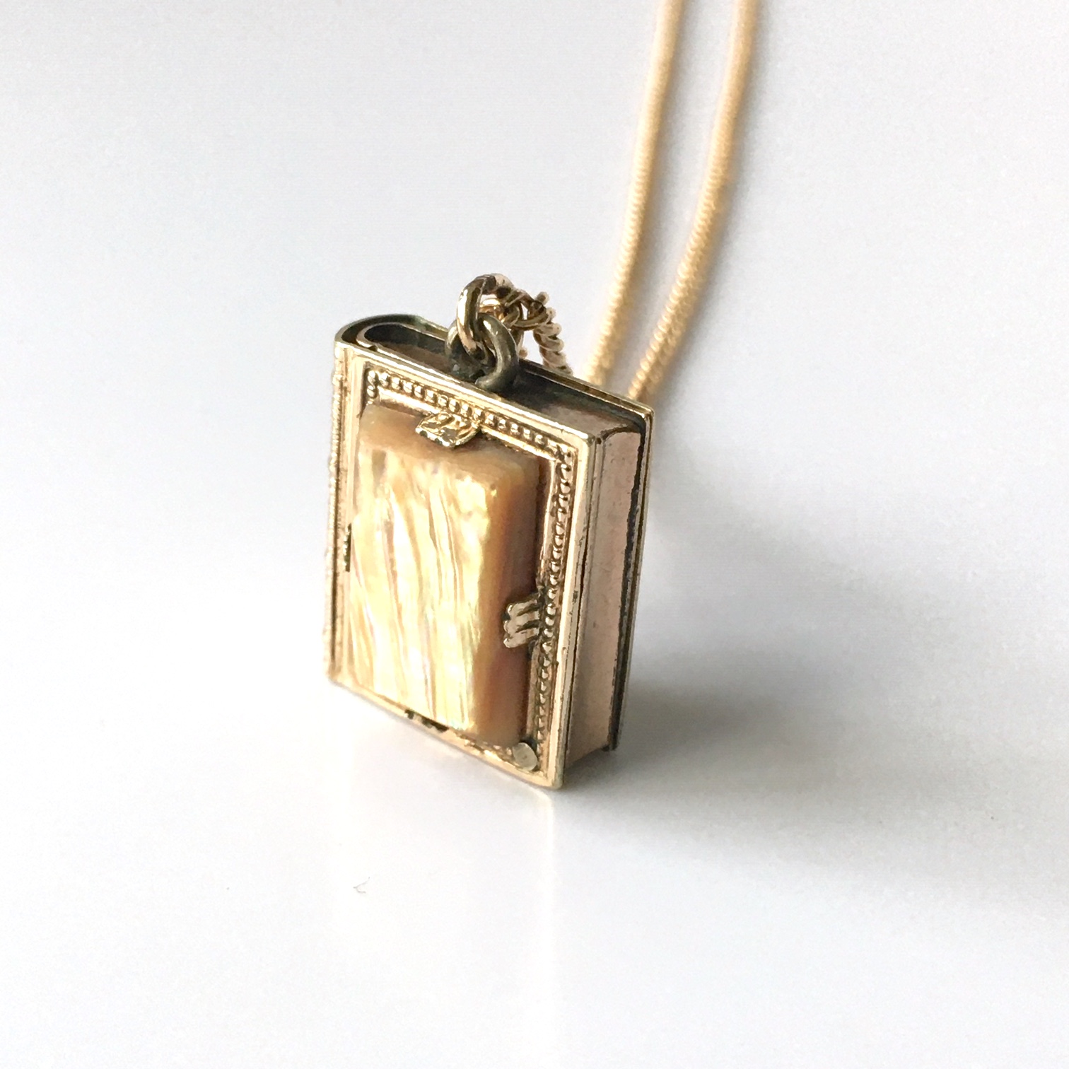antique book locket