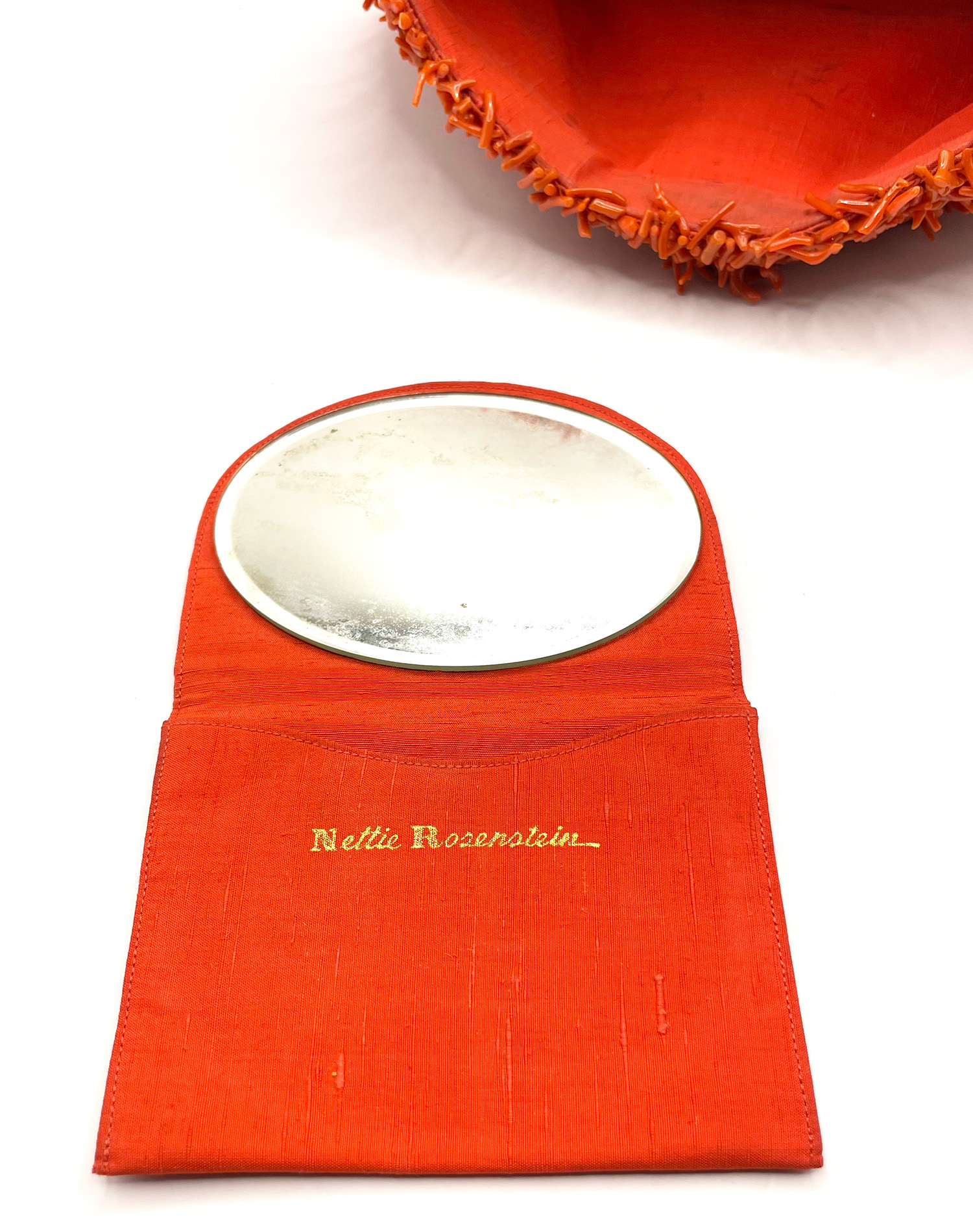 Nettie Rosenstein branch coral clutch purse