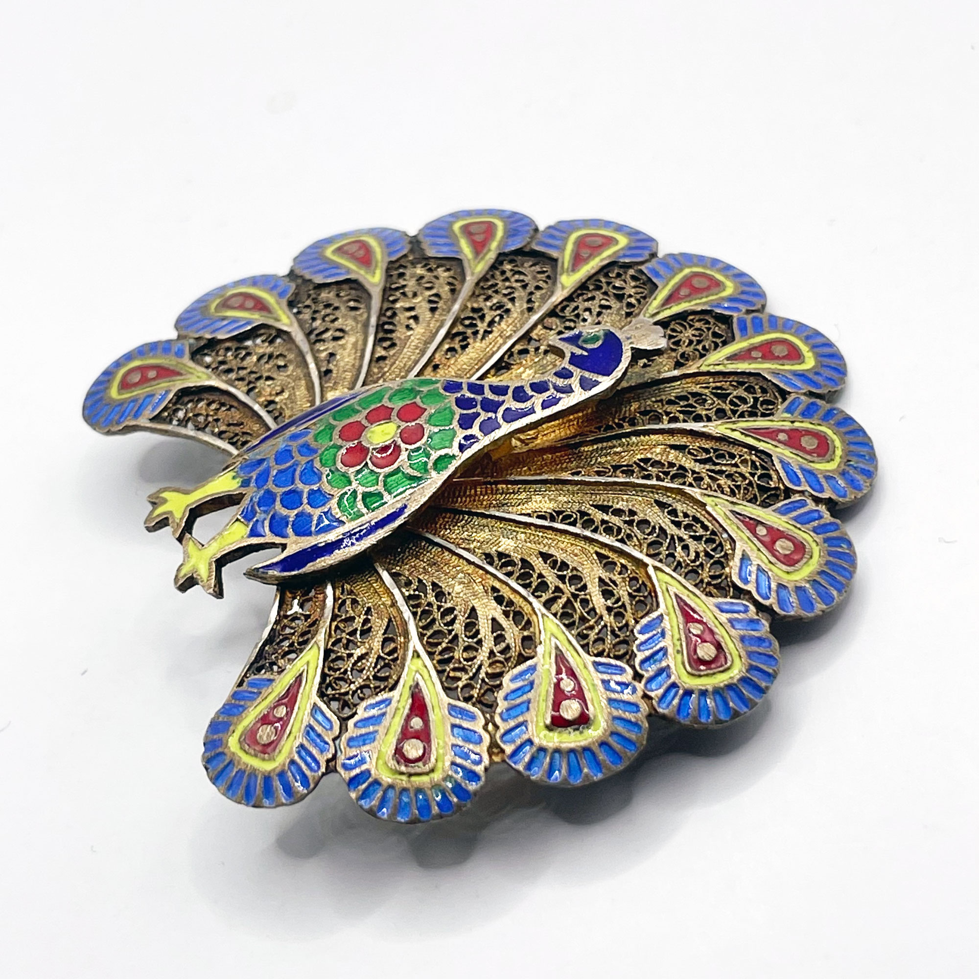 Enameled silver peacock brooch