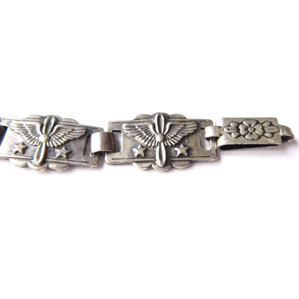 1940's sterling silver propeller and wings bracelet