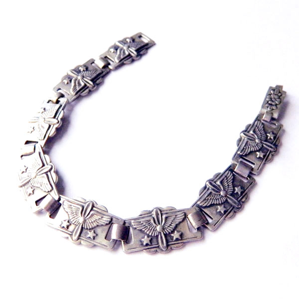 1940's sterling silver propeller and wings bracelet
