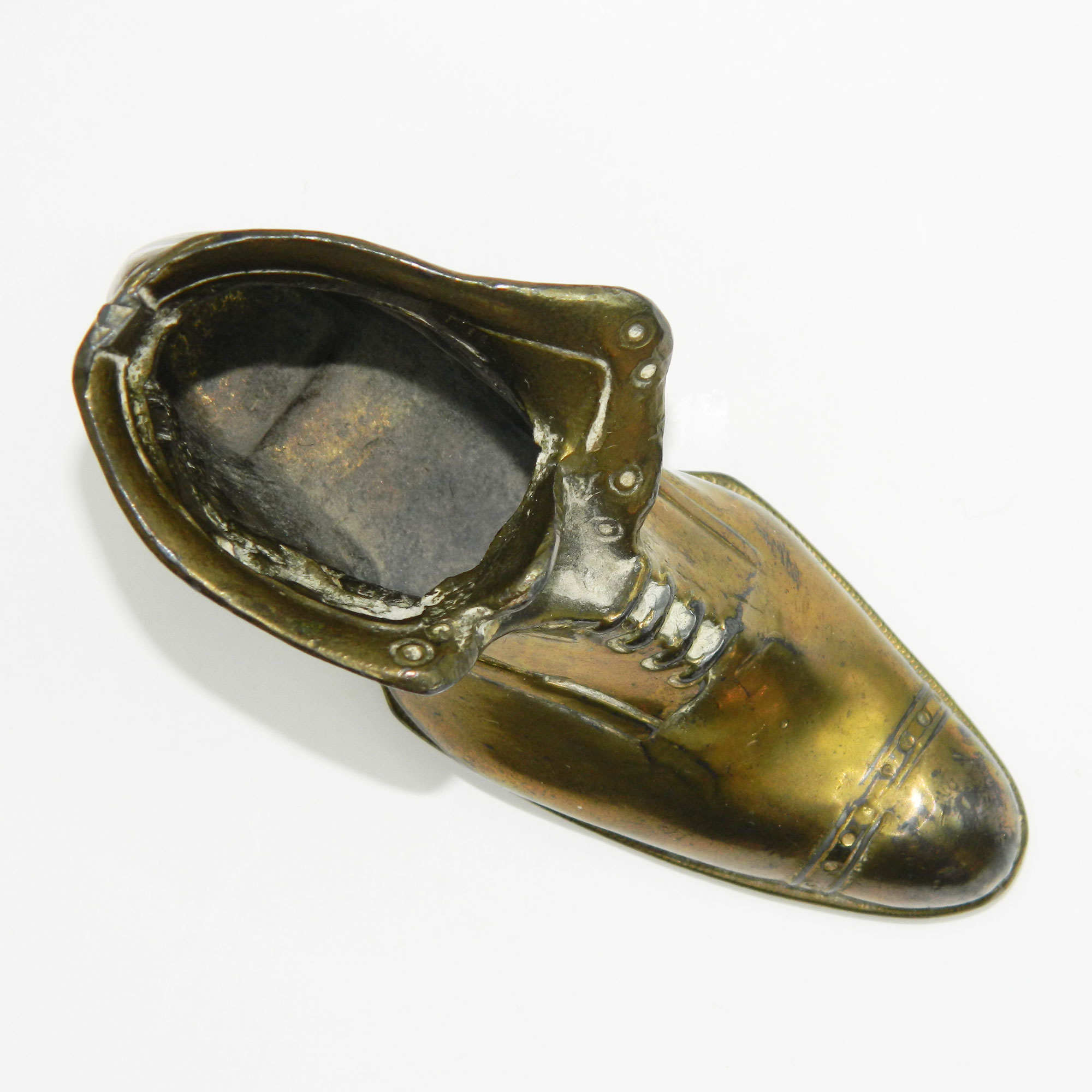 Antique metal shoe