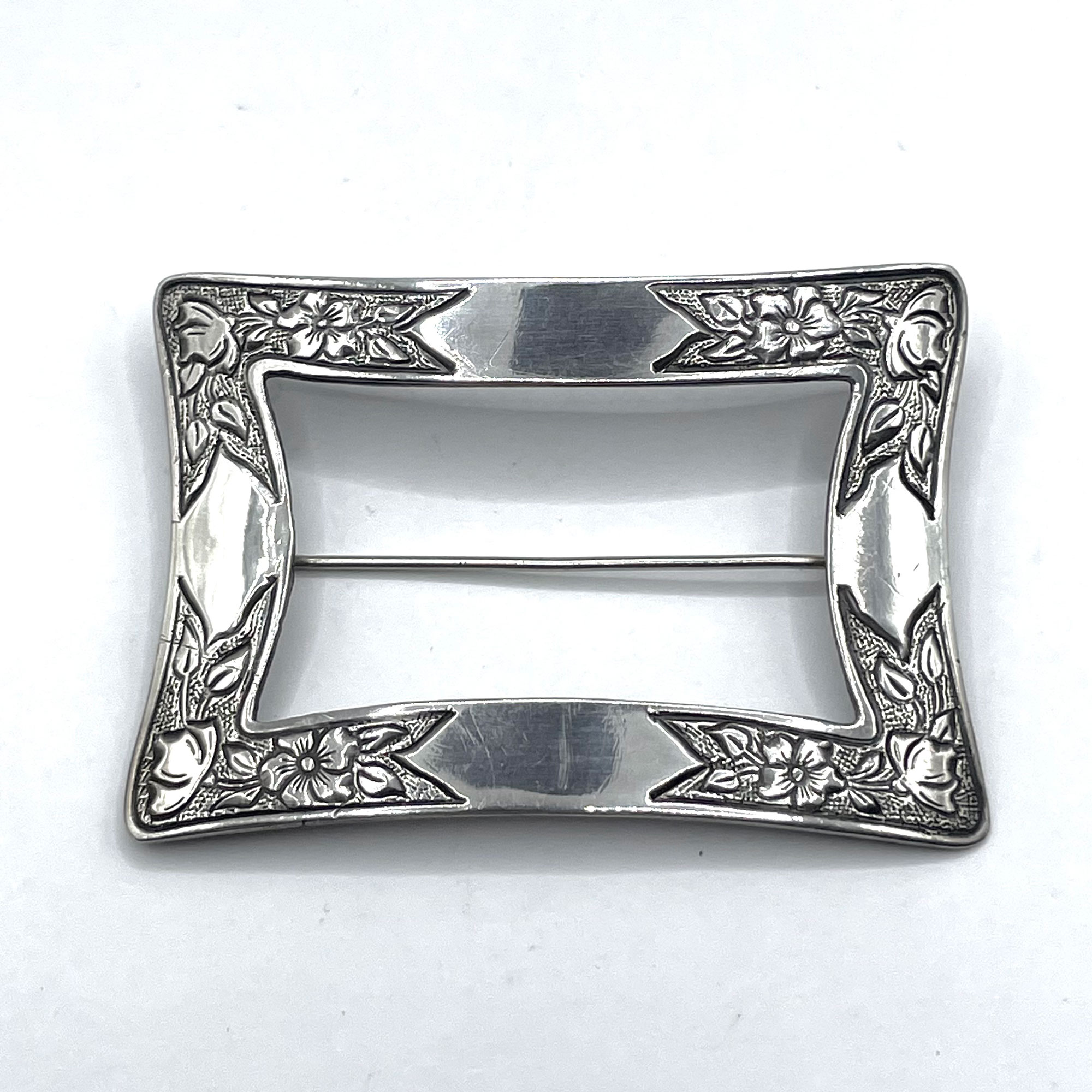 belt buckle brooch