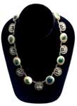 Antique operculum shell silver eagle necklace