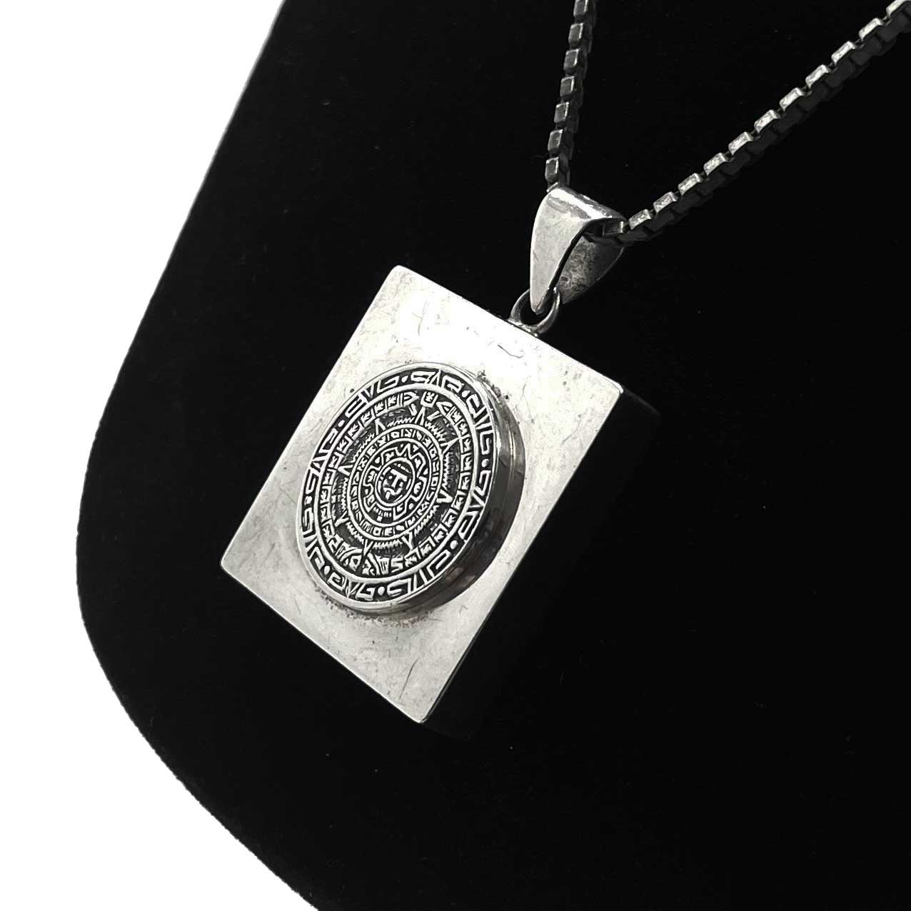 Mexican silver Aztec calendar pendant