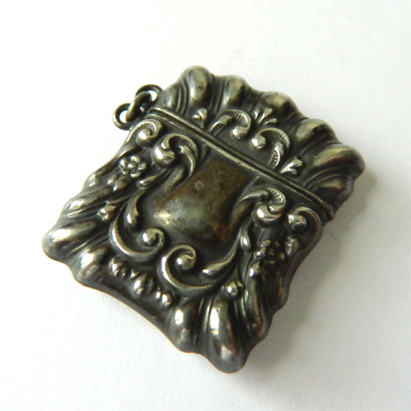 Antique sterling silver stamp case